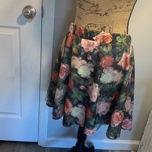 Floral High waisted iridescent effect skirt, size large with stretchy waistband.